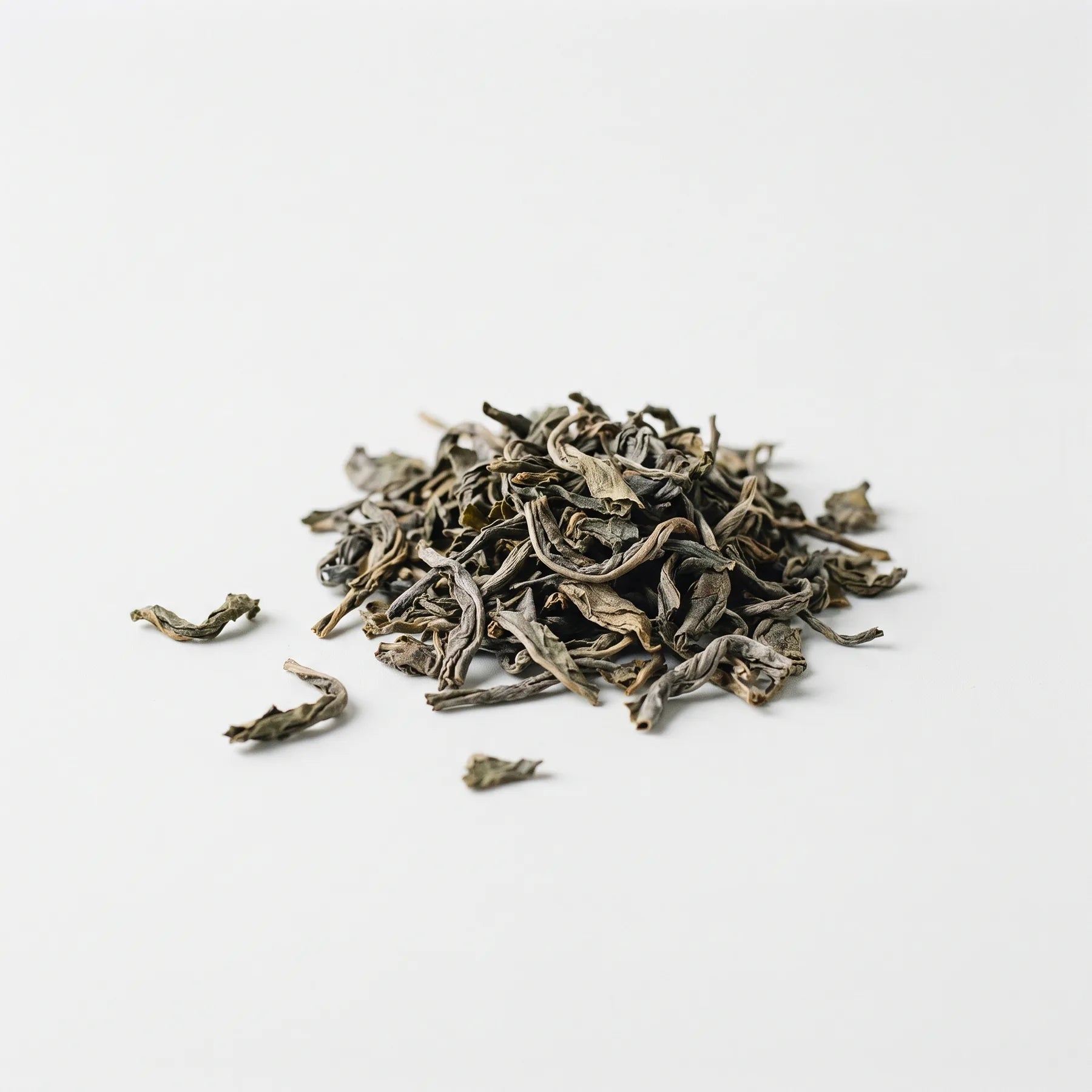 Whole dried tea leaves before milling