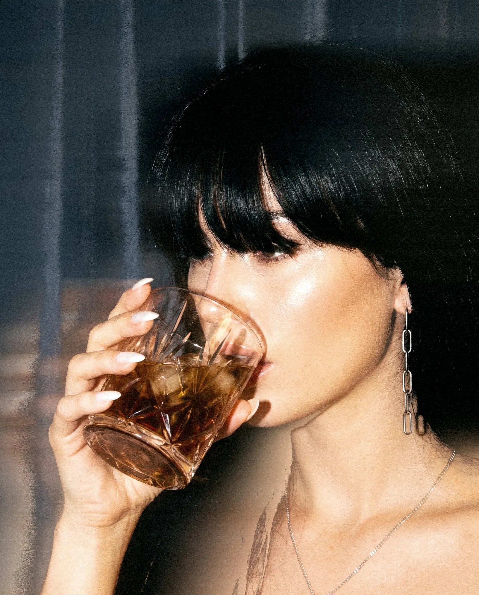 Assam Black Tea, sipped from a crystal tumbler