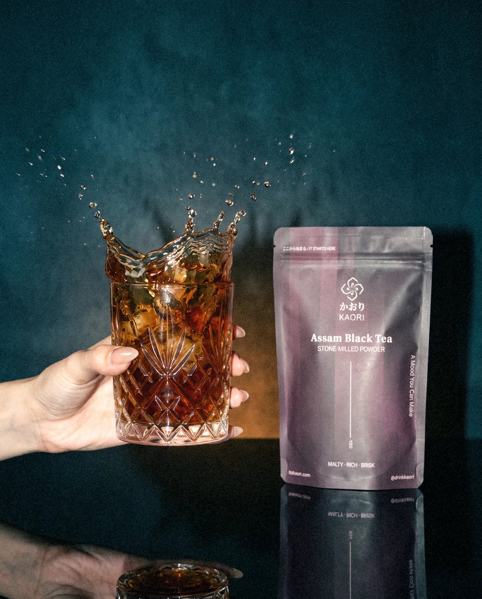 Assam Black Tea, splashing in a crystal tumbler
