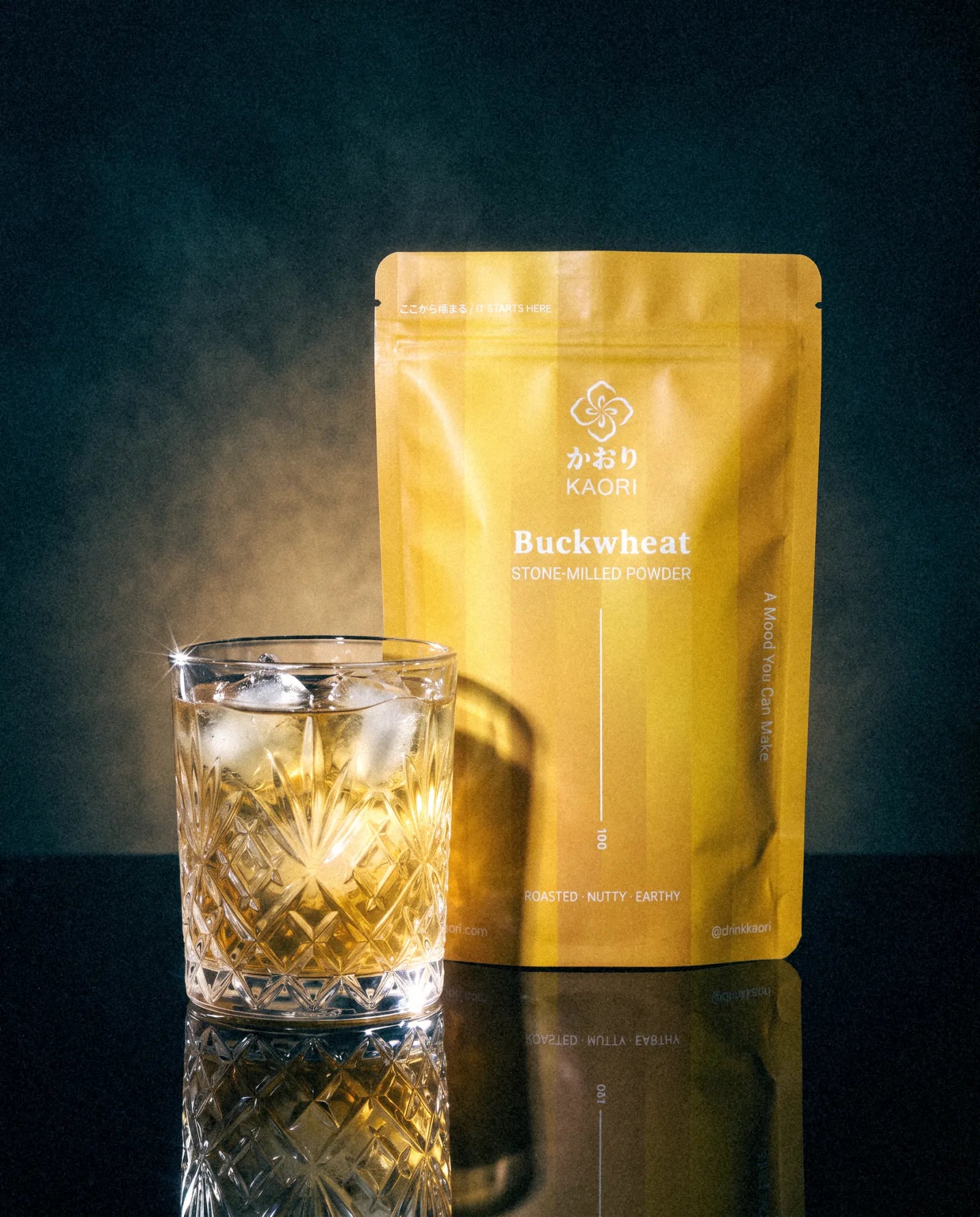 Buckwheat, the pouch beside an iced crystal tumbler