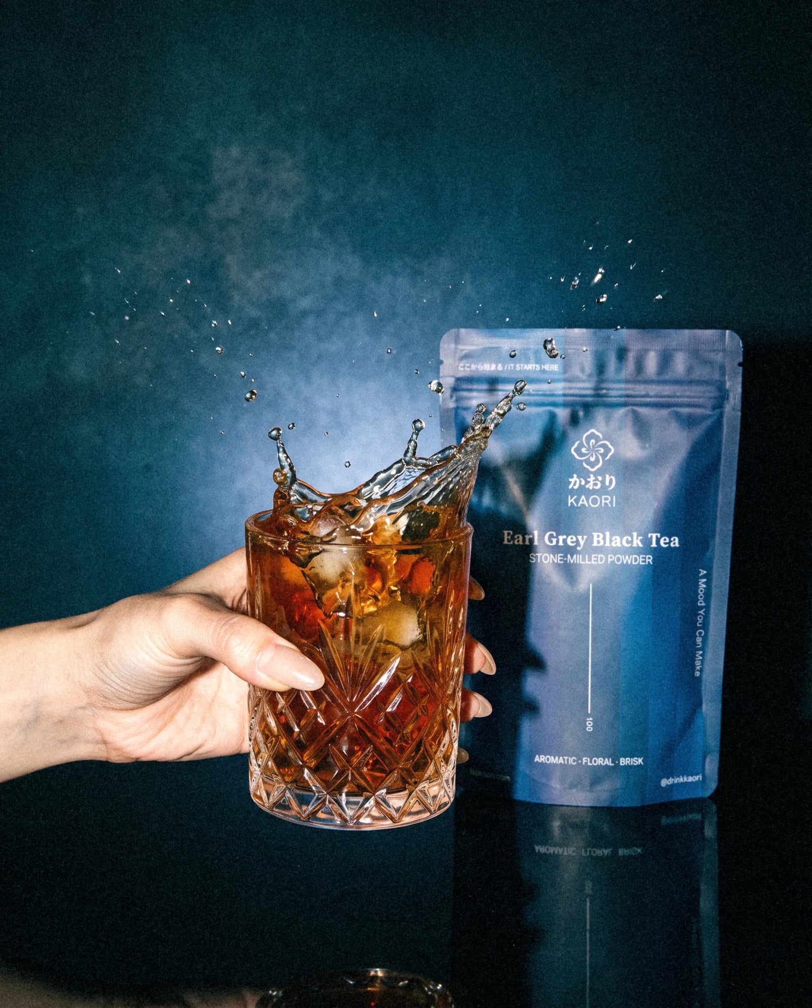 Earl Grey Black Tea, splashing in a crystal tumbler