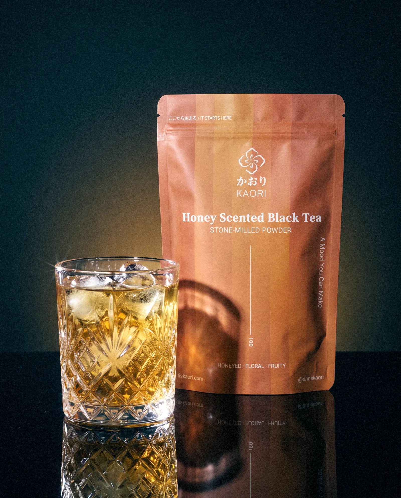 Honey Scented Black Tea, the pouch beside an iced crystal tumbler