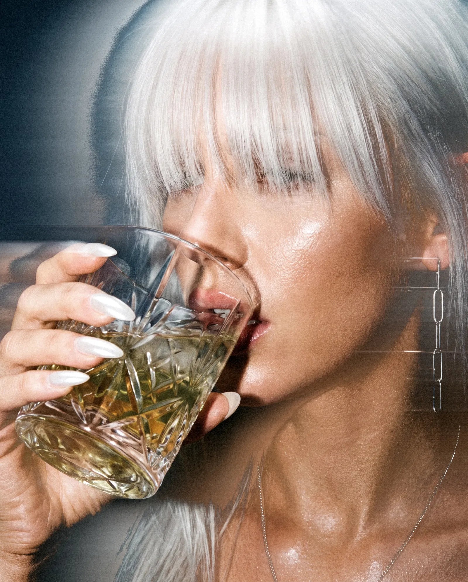 Jasmine Green Tea, sipped from a crystal tumbler