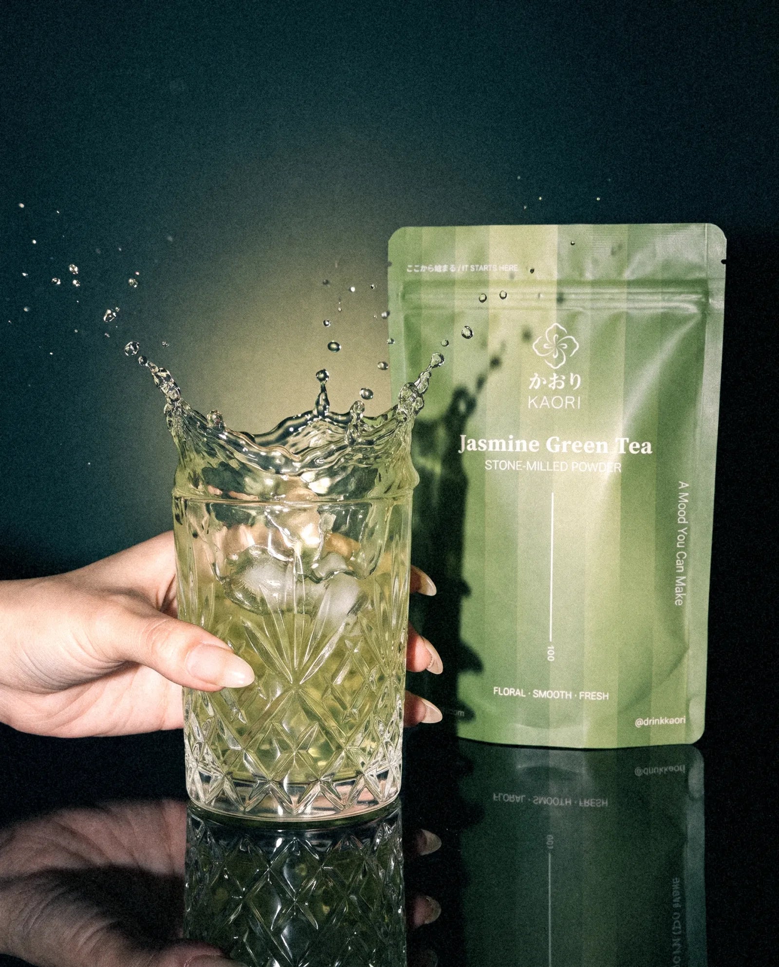 Jasmine Green Tea, splashing in a crystal tumbler