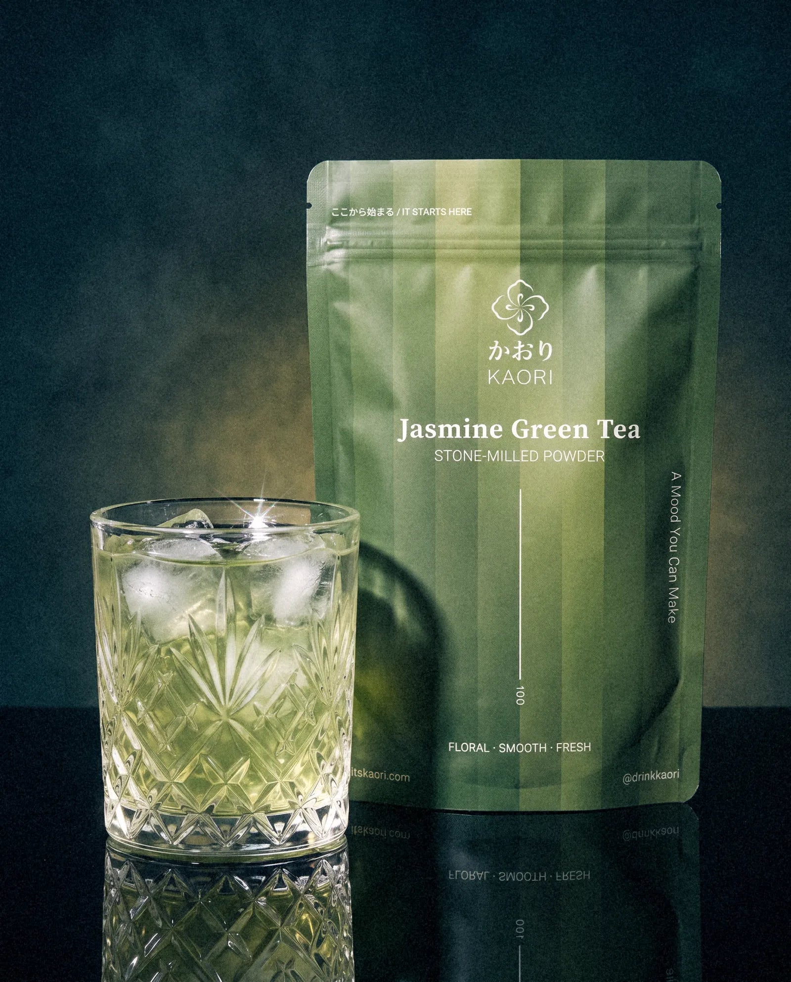 Jasmine Green Tea, the pouch beside an iced crystal tumbler